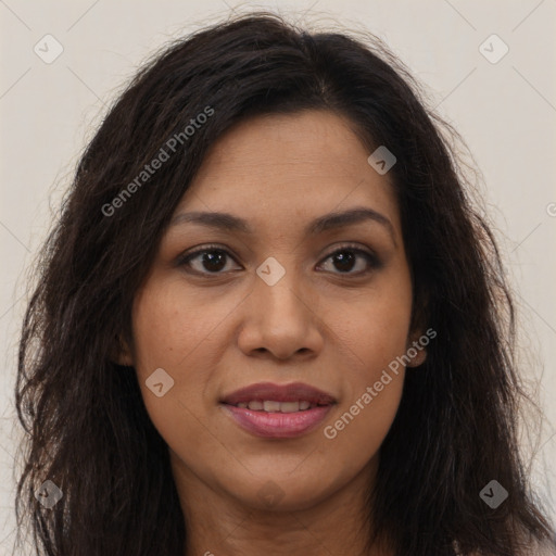 Joyful latino young-adult female with long  brown hair and brown eyes