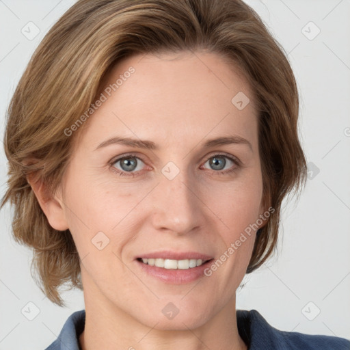 Joyful white young-adult female with medium  brown hair and blue eyes