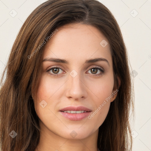 Joyful white young-adult female with long  brown hair and green eyes