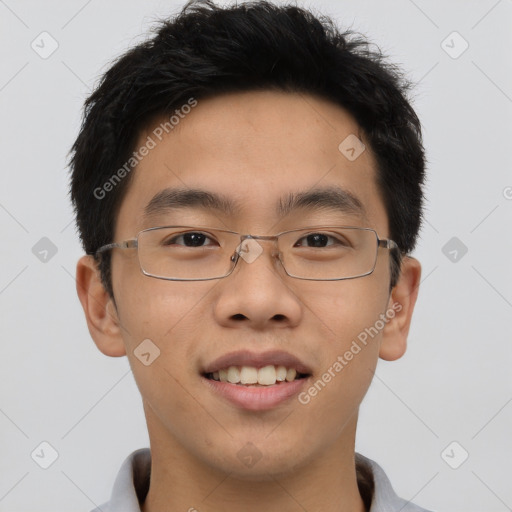 Joyful asian young-adult male with short  brown hair and brown eyes