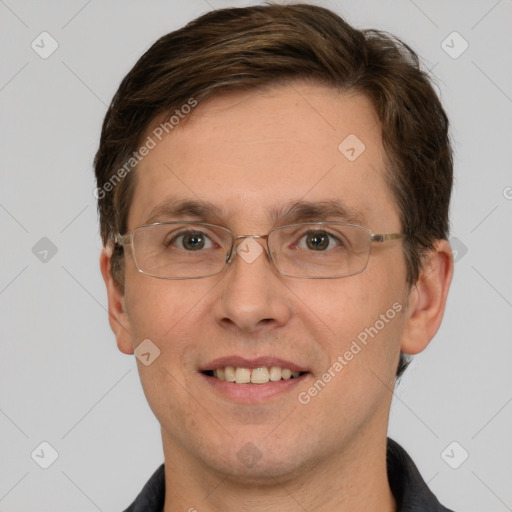 Joyful white adult male with short  brown hair and brown eyes