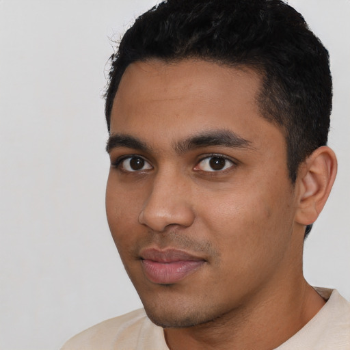 Neutral latino young-adult male with short  black hair and brown eyes