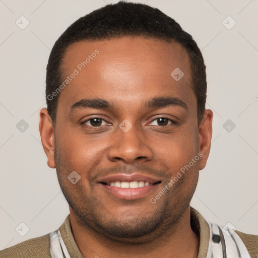 Joyful black young-adult male with short  brown hair and brown eyes