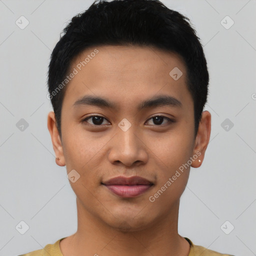 Joyful asian young-adult male with short  black hair and brown eyes