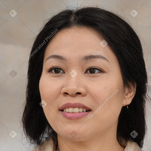 Joyful asian young-adult female with medium  brown hair and brown eyes