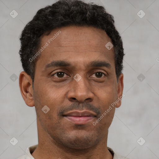 Neutral latino young-adult male with short  brown hair and brown eyes