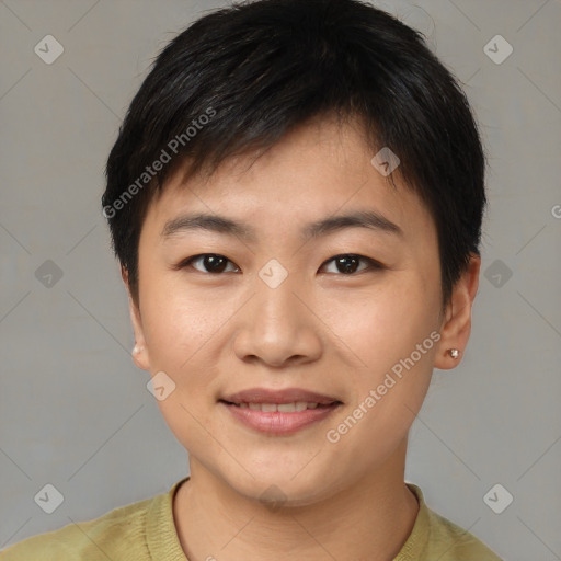 Joyful asian young-adult female with short  brown hair and brown eyes