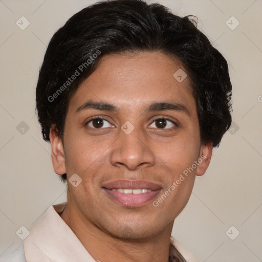 Joyful latino young-adult male with short  brown hair and brown eyes