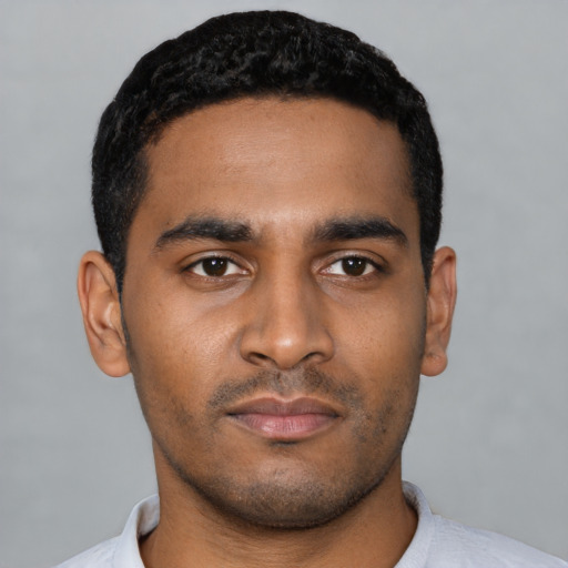 Neutral latino young-adult male with short  black hair and brown eyes
