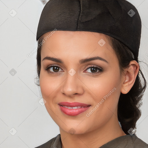 Joyful white young-adult female with medium  black hair and brown eyes