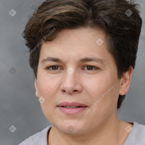 Joyful white adult female with short  brown hair and brown eyes