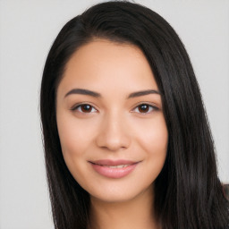 Joyful latino young-adult female with long  black hair and brown eyes