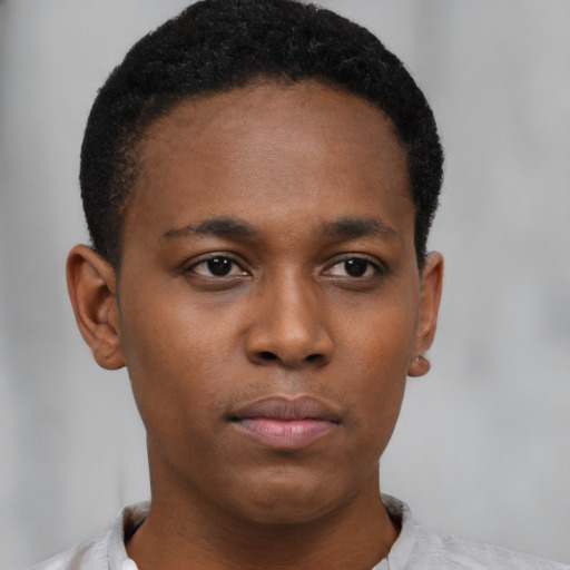 Neutral black young-adult male with short  black hair and brown eyes