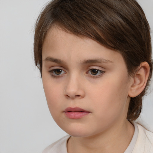 Neutral white child female with medium  brown hair and brown eyes