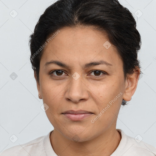 Joyful white adult female with short  brown hair and brown eyes