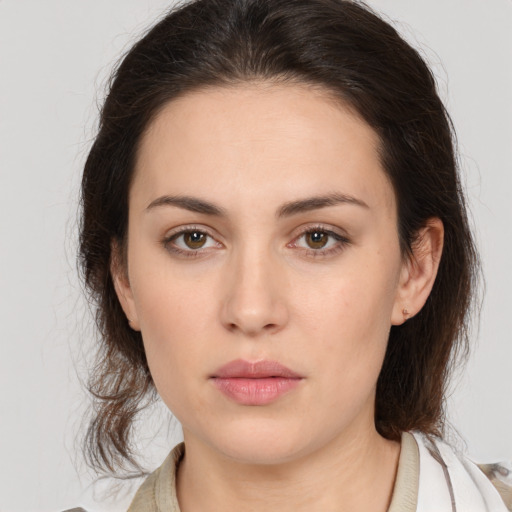 Neutral white young-adult female with medium  brown hair and brown eyes