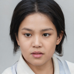 Neutral asian child female with medium  brown hair and brown eyes