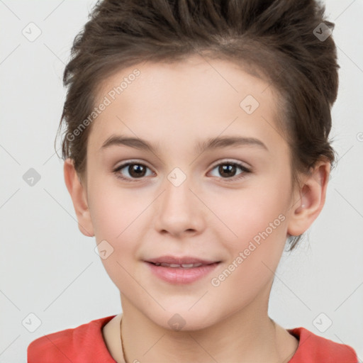 Joyful white child female with short  brown hair and brown eyes