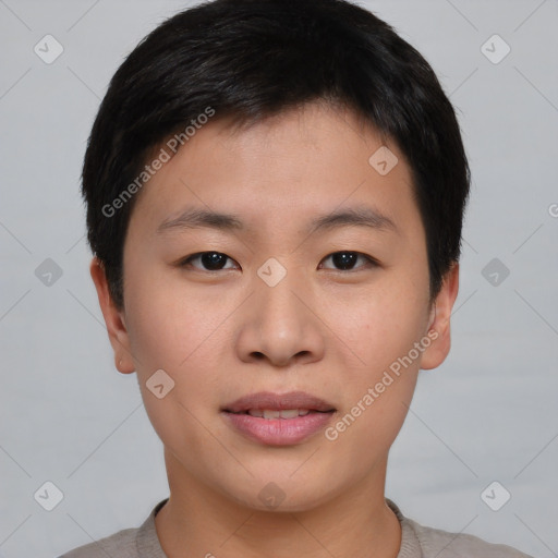 Joyful asian young-adult male with short  brown hair and brown eyes