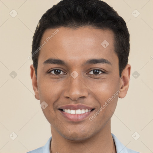 Joyful white young-adult male with short  black hair and brown eyes