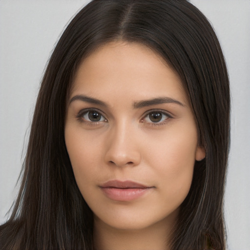 Neutral asian young-adult female with long  brown hair and brown eyes