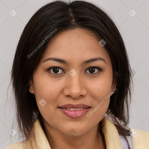 Joyful latino young-adult female with medium  brown hair and brown eyes