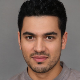 Neutral white young-adult male with short  black hair and brown eyes