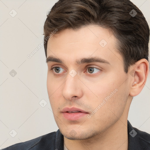 Neutral white young-adult male with short  brown hair and brown eyes