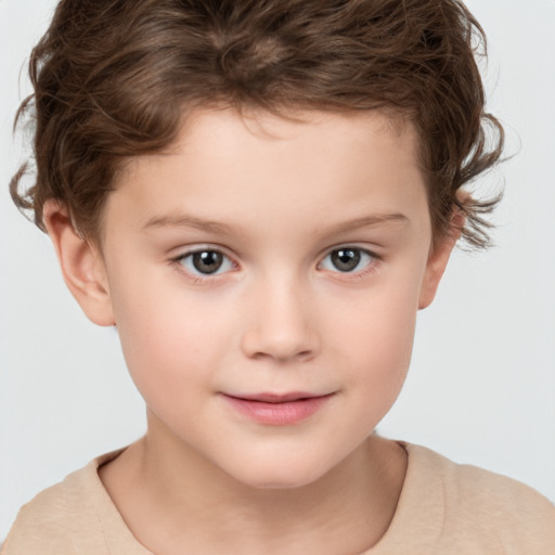 Joyful white child female with short  brown hair and brown eyes