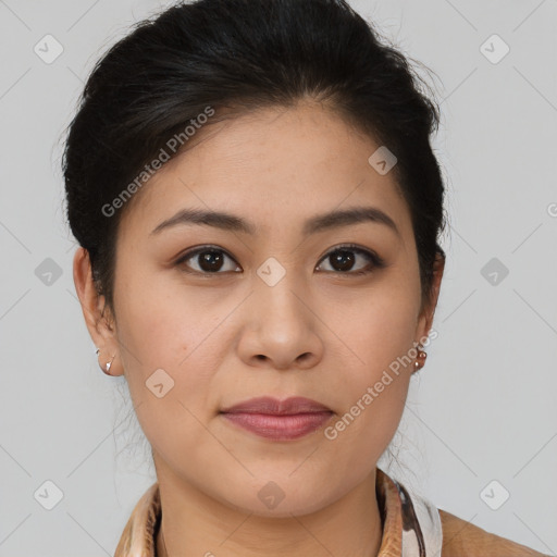 Joyful latino young-adult female with medium  brown hair and brown eyes