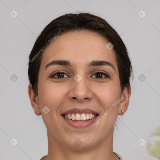 Joyful white young-adult female with short  brown hair and brown eyes