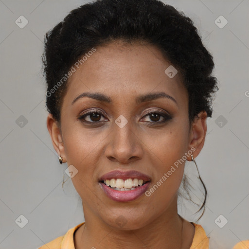 Joyful black young-adult female with short  brown hair and brown eyes