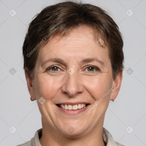 Joyful white adult female with short  brown hair and brown eyes