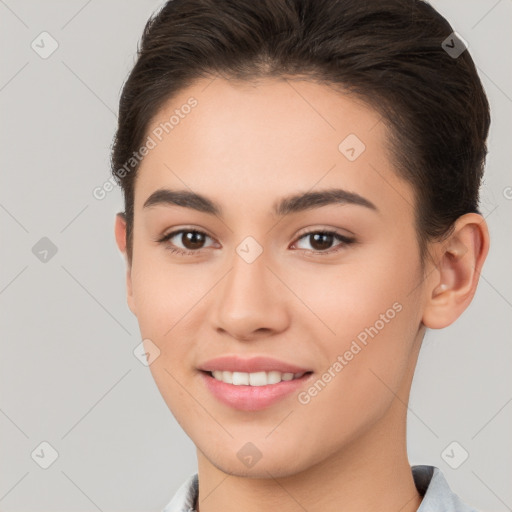 Joyful white young-adult female with short  brown hair and brown eyes