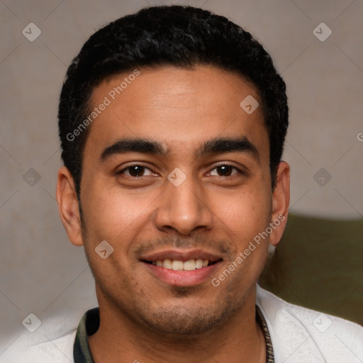 Joyful latino young-adult male with short  black hair and brown eyes