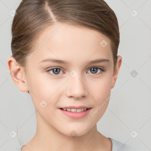 Joyful white child female with short  brown hair and brown eyes