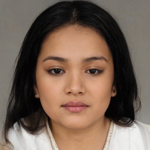 Neutral latino young-adult female with medium  black hair and brown eyes