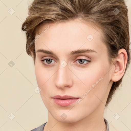 Neutral white young-adult female with medium  brown hair and grey eyes