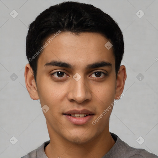 Joyful latino young-adult male with short  black hair and brown eyes