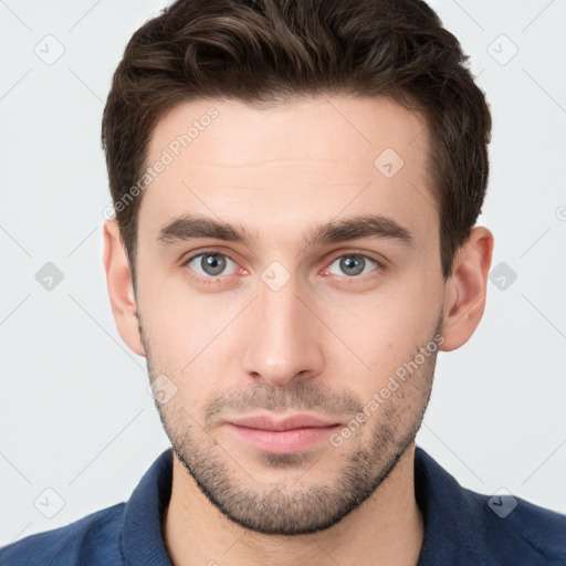 Neutral white young-adult male with short  brown hair and brown eyes