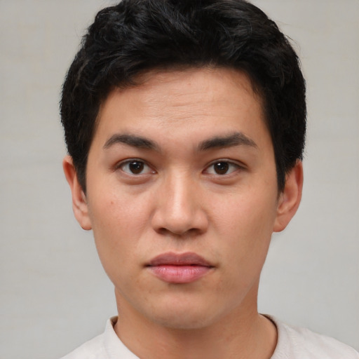 Neutral asian young-adult male with short  black hair and brown eyes