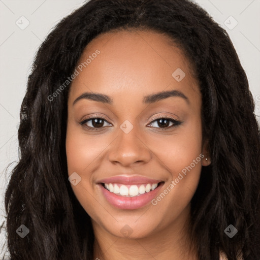 Joyful latino young-adult female with long  black hair and brown eyes