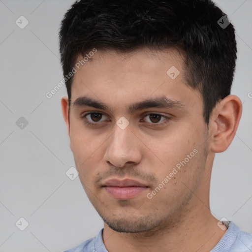 Neutral white young-adult male with short  brown hair and brown eyes