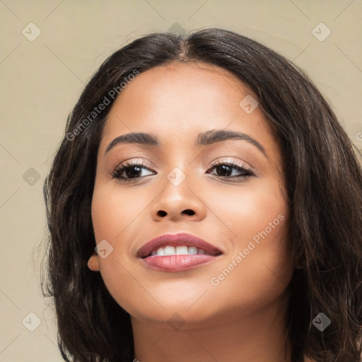 Joyful white young-adult female with long  black hair and brown eyes