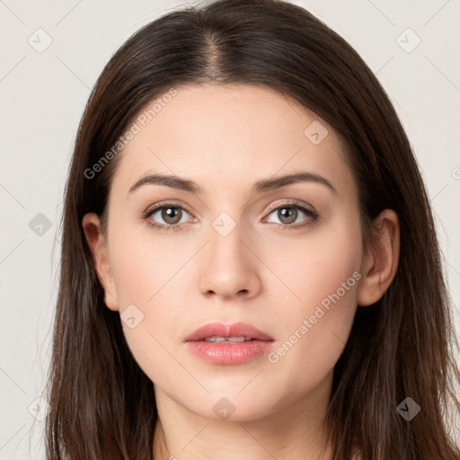 Neutral white young-adult female with long  brown hair and brown eyes