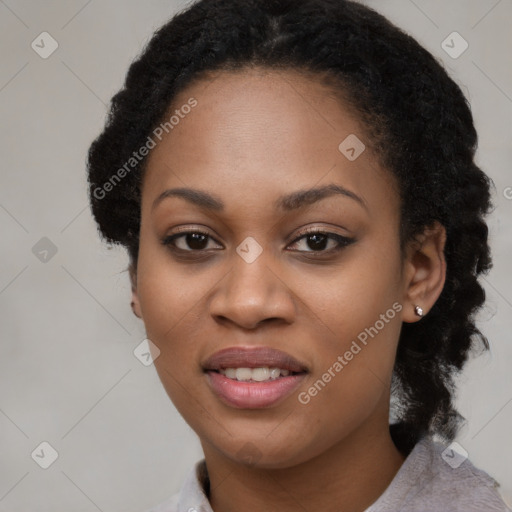 Joyful black young-adult female with medium  black hair and brown eyes