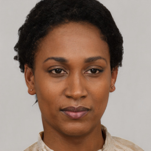 Neutral black young-adult female with short  black hair and brown eyes