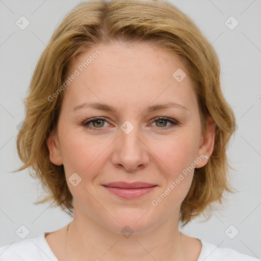 Joyful white young-adult female with medium  brown hair and blue eyes