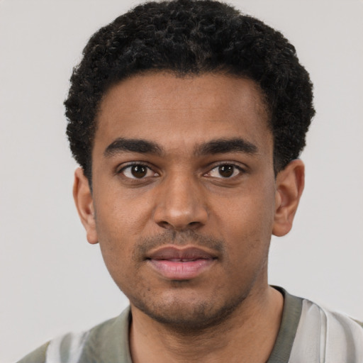 Neutral black young-adult male with short  black hair and brown eyes