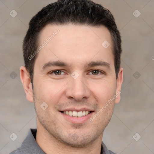 Joyful white young-adult male with short  brown hair and brown eyes